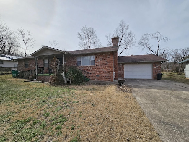 ranch-style house featuring a garage, brick siding, a chimney, and a front lawn