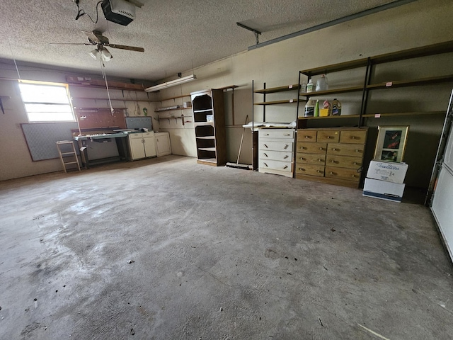 garage featuring ceiling fan and a garage door opener