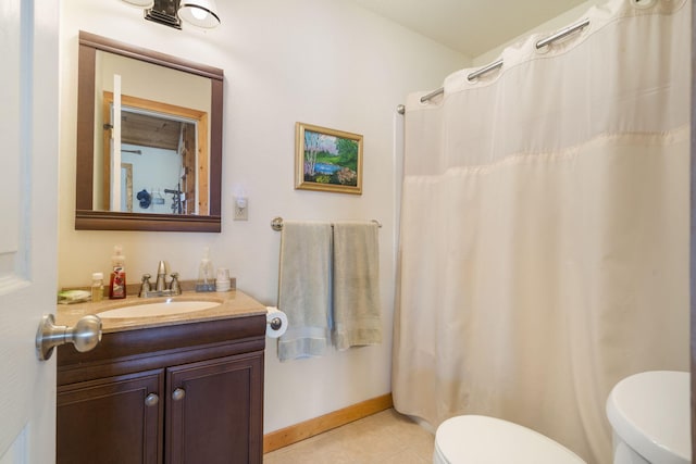 full bathroom featuring baseboards, toilet, a shower with curtain, tile patterned flooring, and vanity