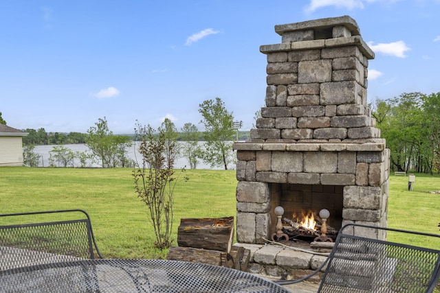 LOT19 Edwards Dr, Shell Knob, MO 65747 - view of patio / terrace with an outdoor stone fireplace and a water view