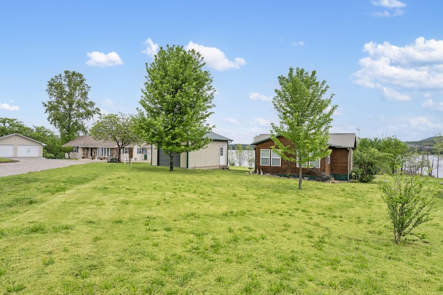 LOT19 Edwards Dr, Shell Knob, MO 65747 - view of green lawn featuring an outdoor structure and a detached garage
