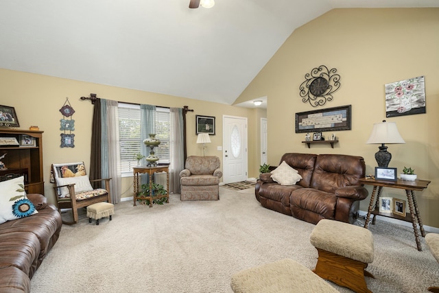 living area featuring carpet floors, high vaulted ceiling, and baseboards