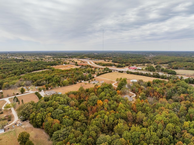 aerial view with a wooded view