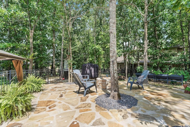 view of patio featuring fence