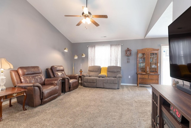 living area featuring visible vents, a ceiling fan, light carpet, vaulted ceiling, and baseboards