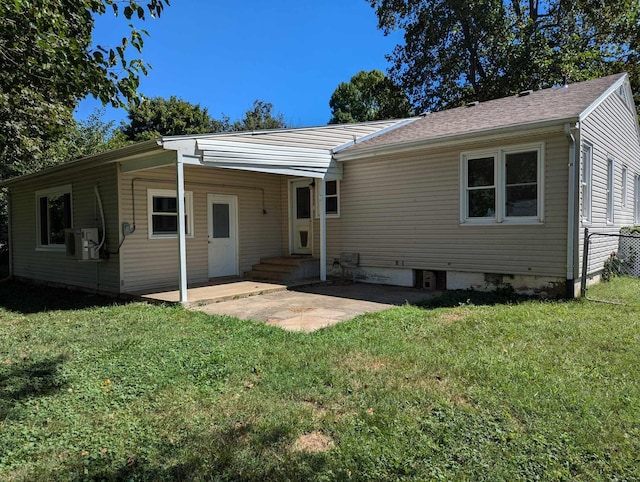 view of front facade featuring crawl space, a patio area, and a front lawn