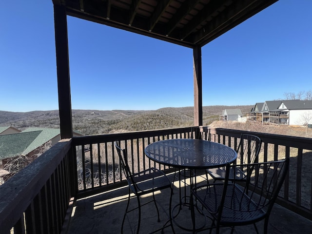 balcony featuring a mountain view