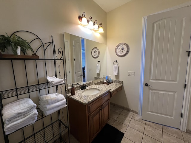 bathroom with vanity and tile patterned floors