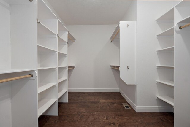 spacious closet with visible vents and wood finished floors