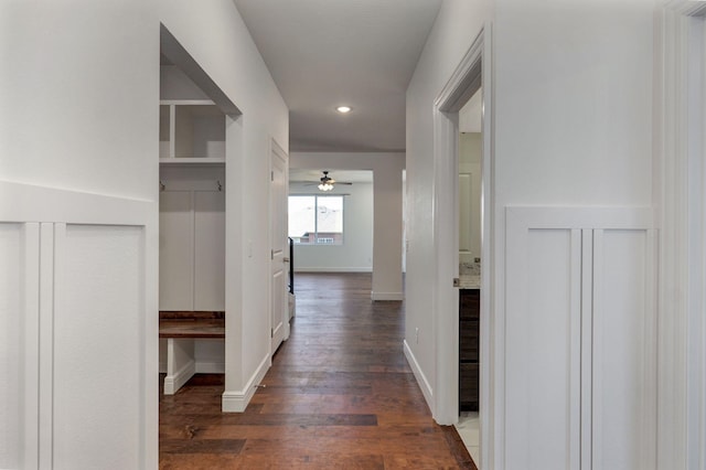 hall with recessed lighting, baseboards, and wood finished floors