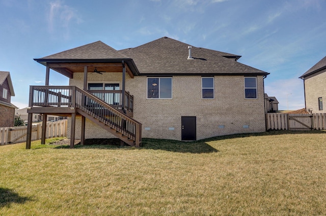 rear view of house featuring roof with shingles, crawl space, a gate, stairs, and brick siding