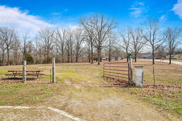 view of yard with a gate and fence