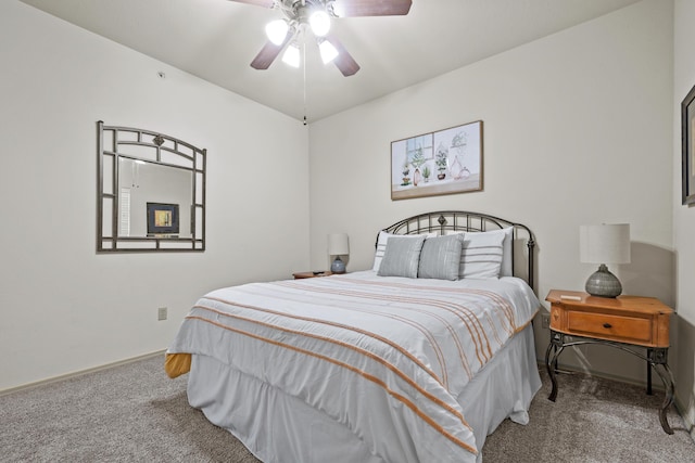 bedroom featuring carpet floors, baseboards, and a ceiling fan