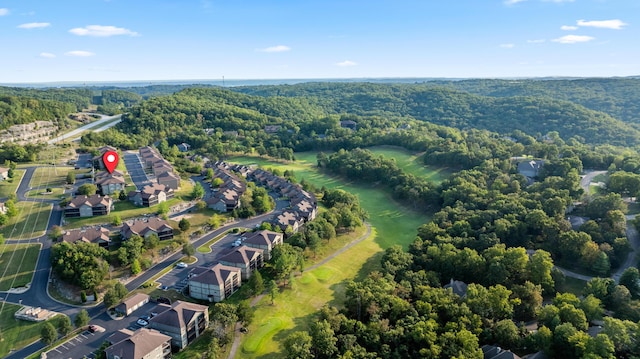 birds eye view of property featuring a residential view and a view of trees