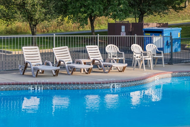 pool featuring fence