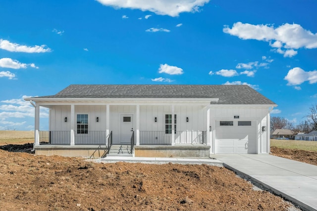 ranch-style house with driveway, roof with shingles, a porch, a garage, and board and batten siding