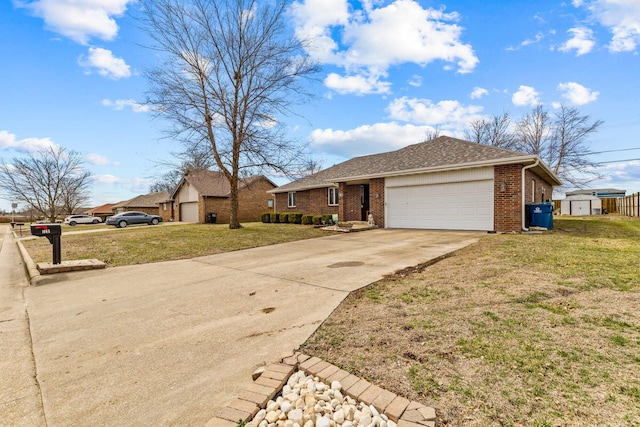 ranch-style house with a front yard, brick siding, driveway, and an attached garage