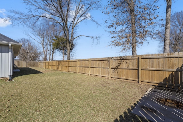 view of yard featuring a fenced backyard