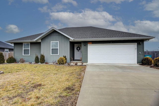 ranch-style house featuring board and batten siding, a front yard, fence, a garage, and driveway