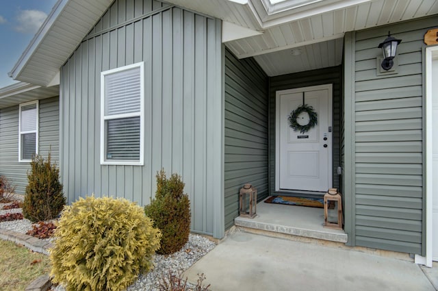 property entrance with board and batten siding