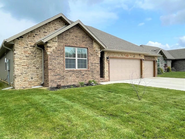 single story home with roof with shingles, concrete driveway, a front yard, a garage, and stone siding