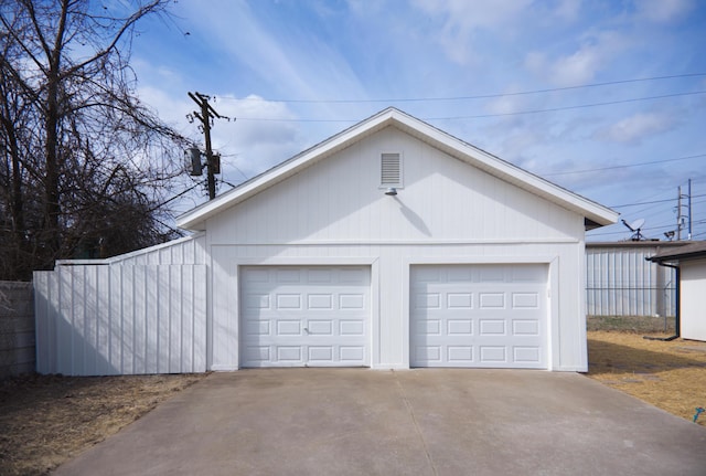 detached garage with fence