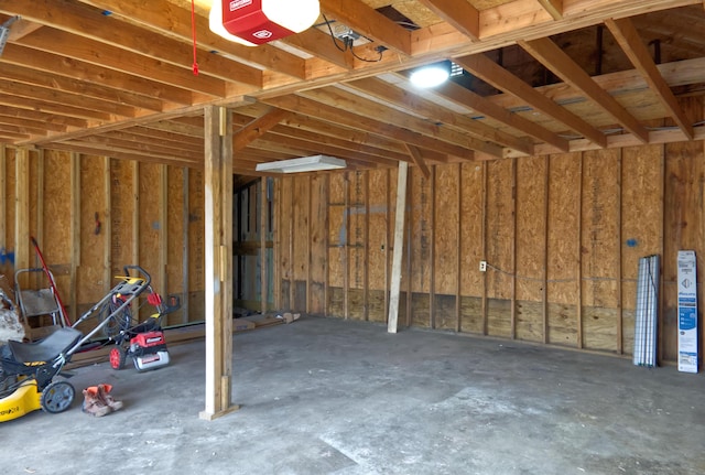 miscellaneous room featuring unfinished concrete flooring