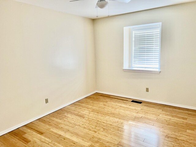 109 Lancashire Dr, Branson, MO 65616 - unfurnished room featuring baseboards, visible vents, ceiling fan, and wood-type flooring