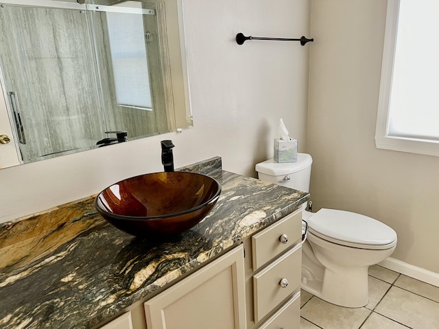 109 Lancashire Dr, Branson, MO 65616 - bathroom featuring a shower, baseboards, toilet, vanity, and tile patterned flooring