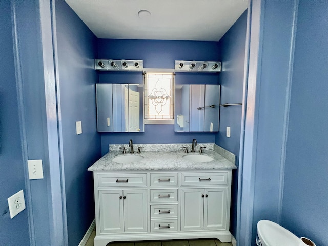 109 Lancashire Dr, Branson, MO 65616 - full bath with toilet, a sink, and double vanity
