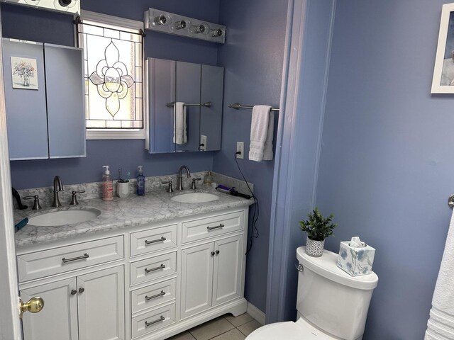 109 Lancashire Dr, Branson, MO 65616 - full bath featuring toilet, a sink, double vanity, and tile patterned flooring