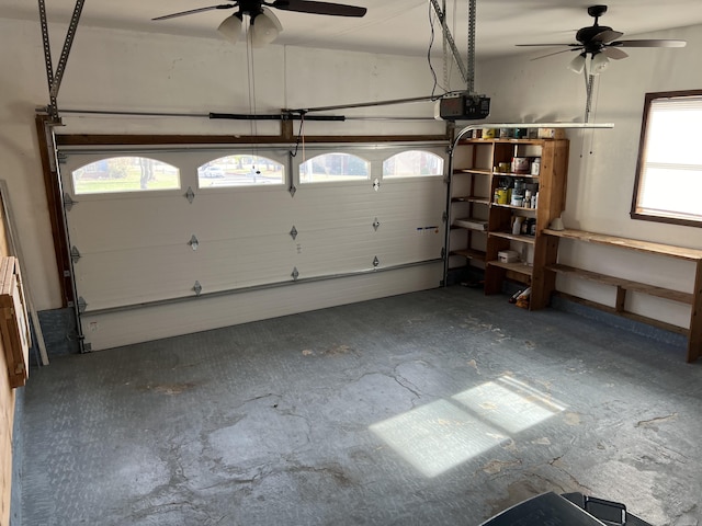109 Lancashire Dr, Branson, MO 65616 - garage featuring a garage door opener and ceiling fan