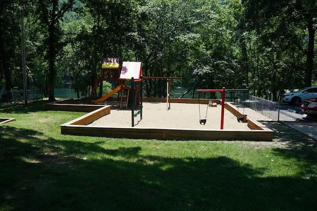 community play area with a yard