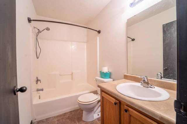 bathroom with shower / tub combination, tile patterned flooring, vanity, and toilet