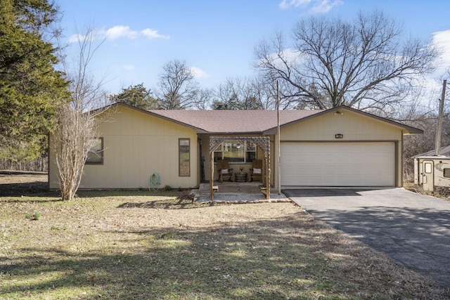 view of front facade with driveway and an attached garage