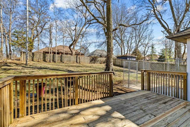 deck featuring a fenced backyard