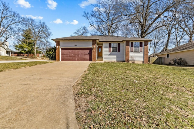 ranch-style house featuring an attached garage, driveway, a front yard, and brick siding