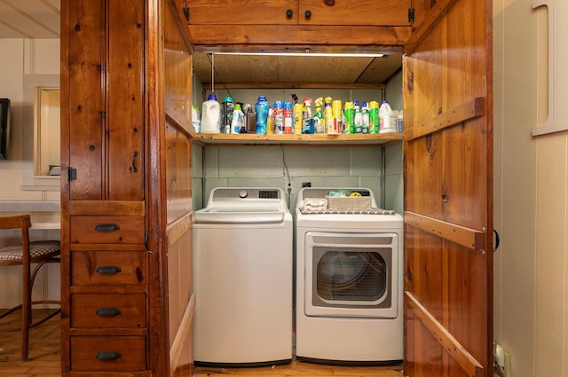 laundry area featuring laundry area and washer and clothes dryer