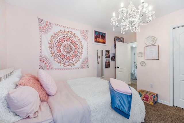 bedroom featuring a notable chandelier, carpet flooring, baseboards, and a closet