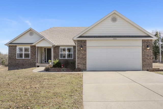 ranch-style house with concrete driveway, a garage, brick siding, and a front lawn