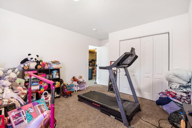 exercise room featuring carpet floors