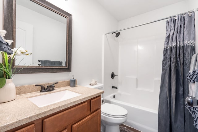 full bath with vanity, shower / bath combination with curtain, and toilet