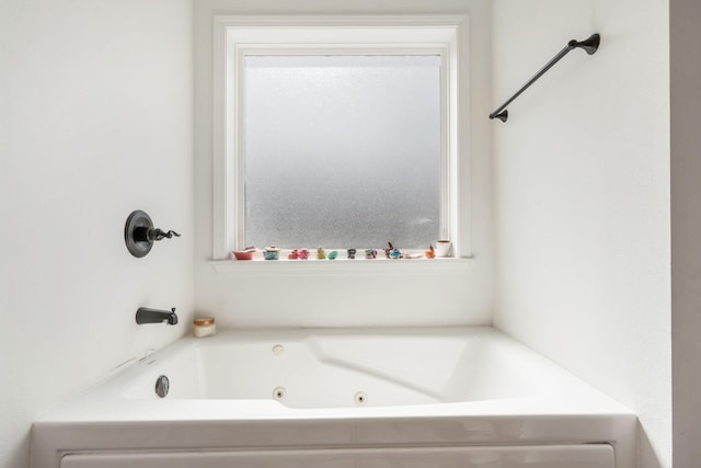 bathroom featuring a whirlpool tub