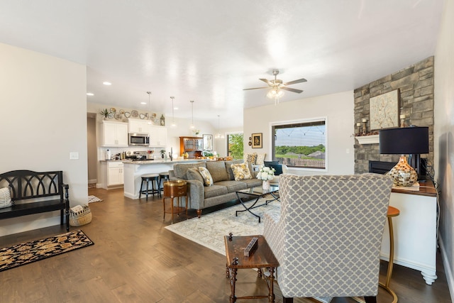 4427 E Kentbrook Dr, Springfield, MO 65802 - living room with a ceiling fan, dark wood-type flooring, a fireplace, and recessed lighting