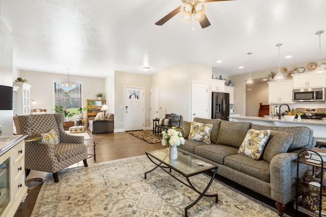 4427 E Kentbrook Dr, Springfield, MO 65802 - living area with a ceiling fan, dark wood-type flooring, baseboards, and recessed lighting