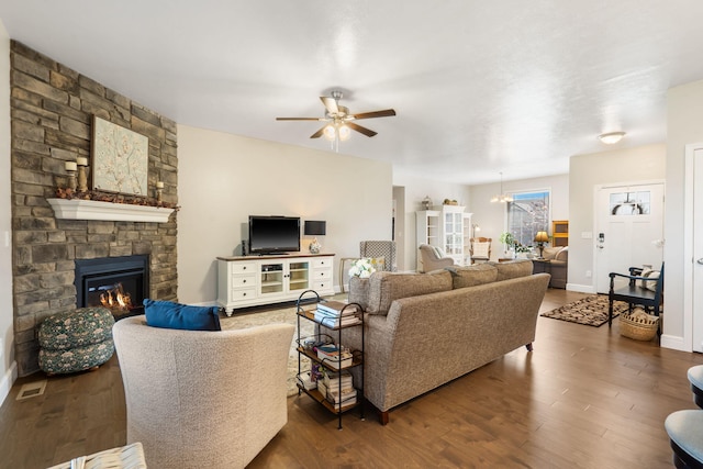 4427 E Kentbrook Dr, Springfield, MO 65802 - living room featuring ceiling fan, wood finished floors, and a fireplace
