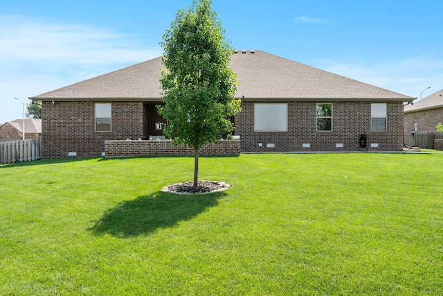 4427 E Kentbrook Dr, Springfield, MO 65802 - back of property with brick siding and a shingled roof