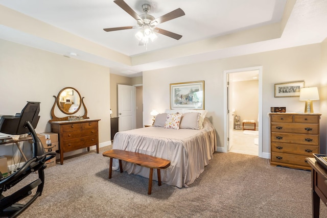 4427 E Kentbrook Dr, Springfield, MO 65802 - bedroom featuring light carpet, a tray ceiling, baseboards, ceiling fan, and ensuite bath