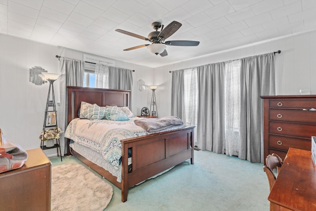 carpeted bedroom with a ceiling fan