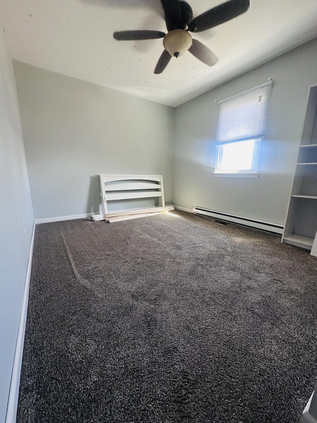 unfurnished room featuring ceiling fan, baseboards, baseboard heating, and carpet flooring